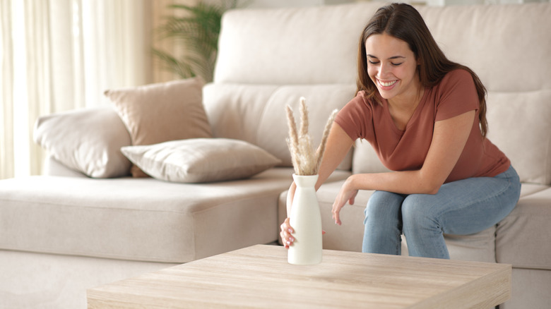 woman happy with coffee table
