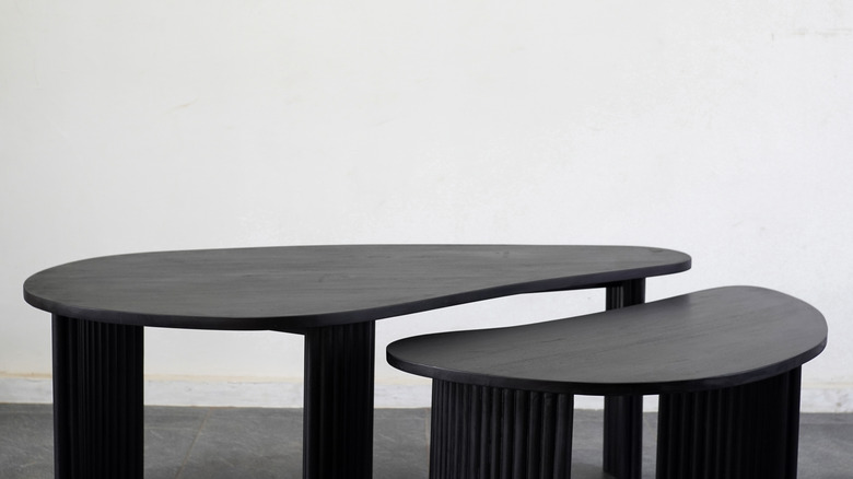 two black nesting coffee tables