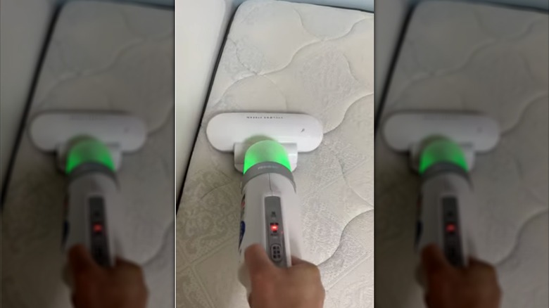Super Suction Futon Cleaner in use on a mattress