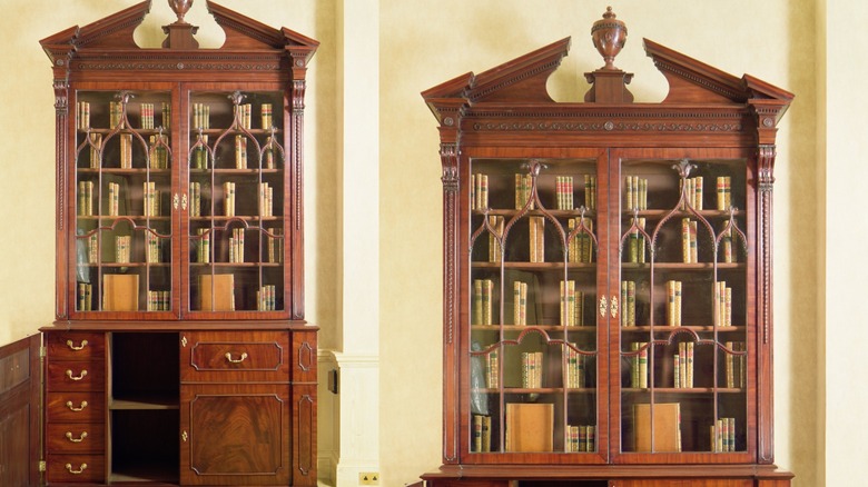 A split image of a Chippendale bookcase on chest, with a close inlay of features on the right side.