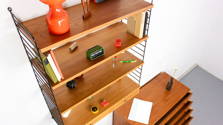 An aerial view of a string shelving system made from metal and wood.