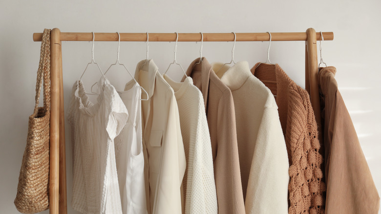 Hanging clothes on rack