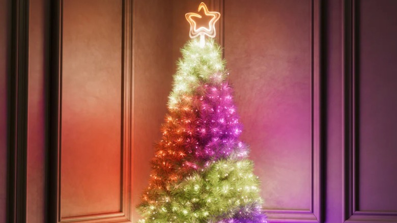 Bright star tree topper on lighted tree