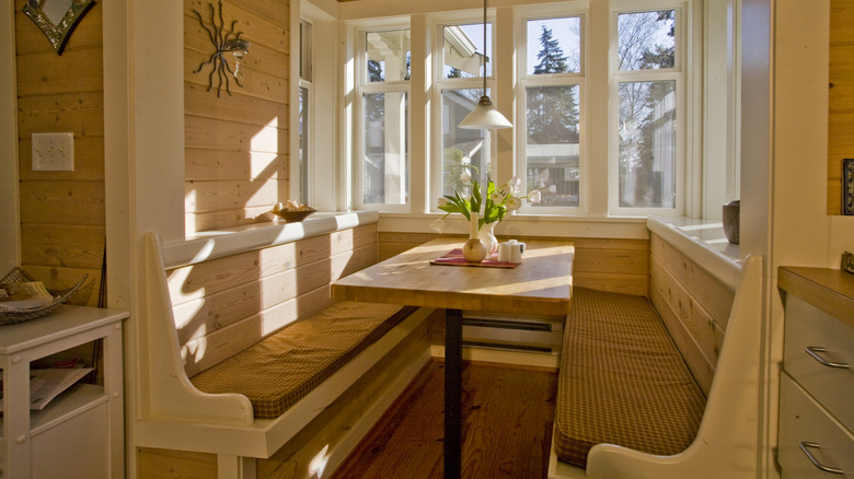A wooden cottage-style banquette