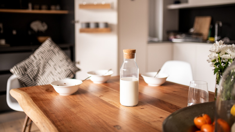 A wood table in a kitchen