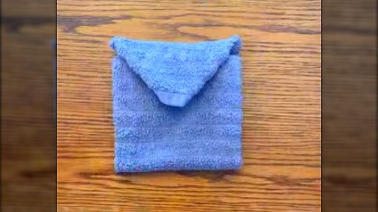 Envelope-folded towel.