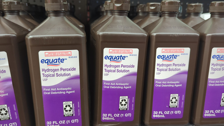 Multiple brown bottles of hydrogen peroxide
