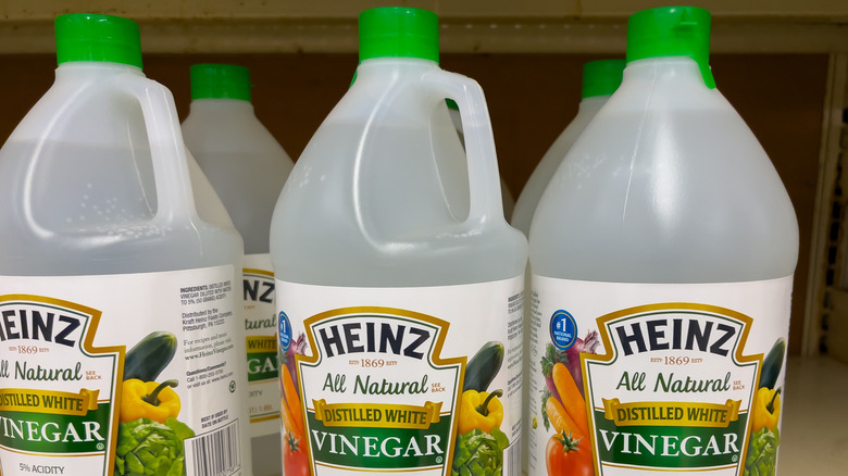 Bottles of Heinz white vinegar on a shelf