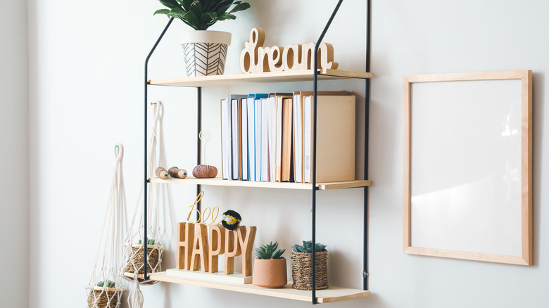 Hanging shelf with books