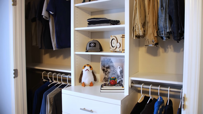 Closet with dresser and shelves