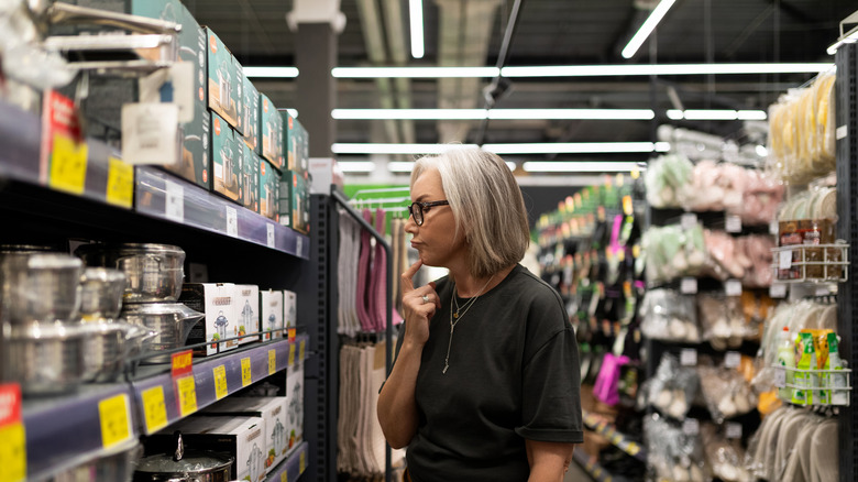 Close up of woman shopping in retail store