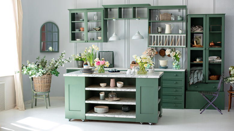 green kitchen with island
