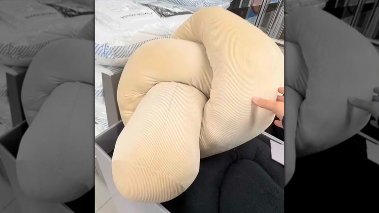 Aldi's Giant Knot Pillow in beige