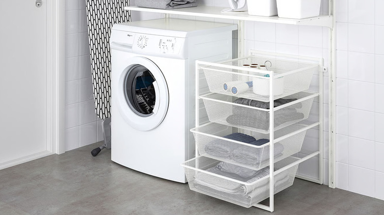 Room with washing machine and storage drawers