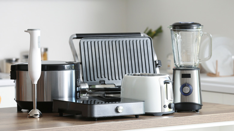 A kitchen counter with several appliances on it
