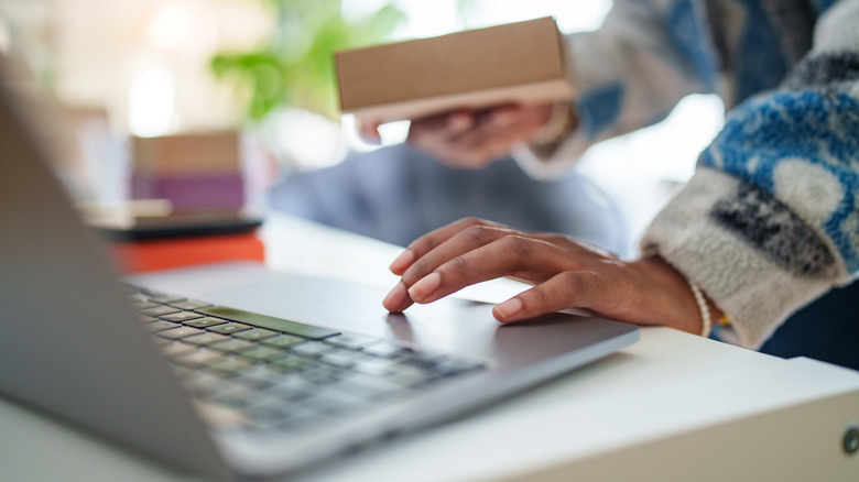 a woman working on her laptop