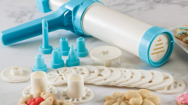 Blue and white cookie decorator kit on white kitchen countertop