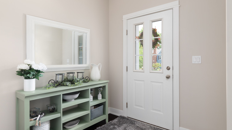 Cozy entryway with white walls