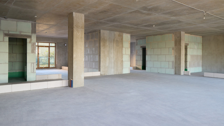 An unfinished home with an open floor plan