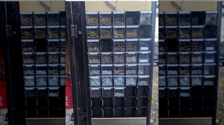 tilt bins mounted in workspace to hold various nails