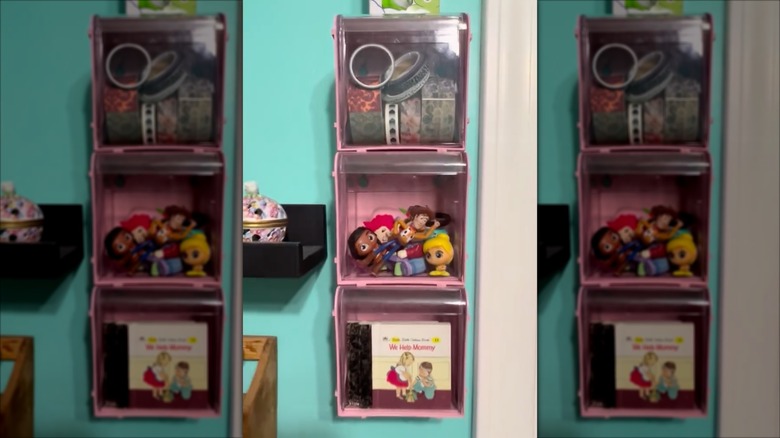 wall-mounted, stackable tilt bins filled with children's knick-knacks