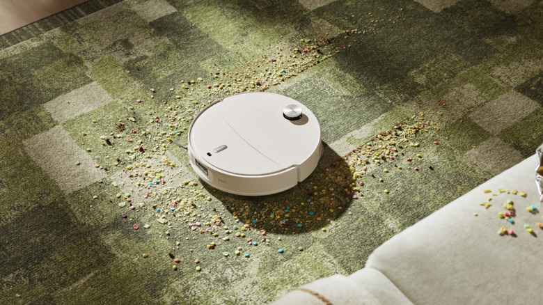 Roborock's QX Revo Ultra 2 Robot Vacuum and Mop cleaning a rug