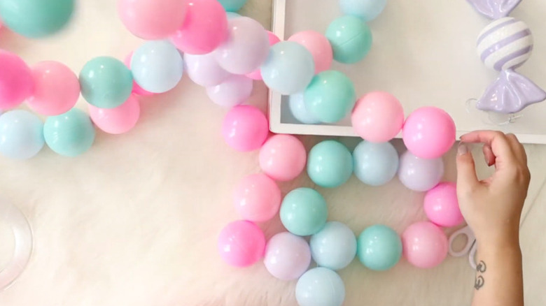 Pastel colored garland made from plastic balls