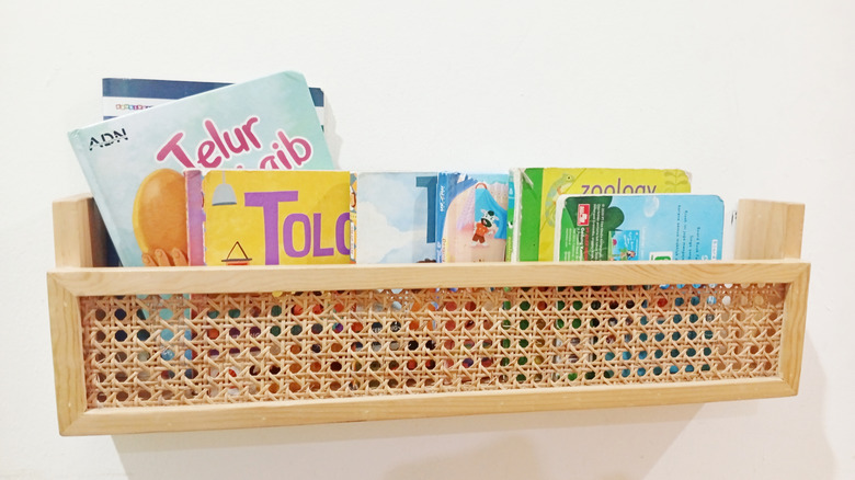 Kids' books on tan floating display