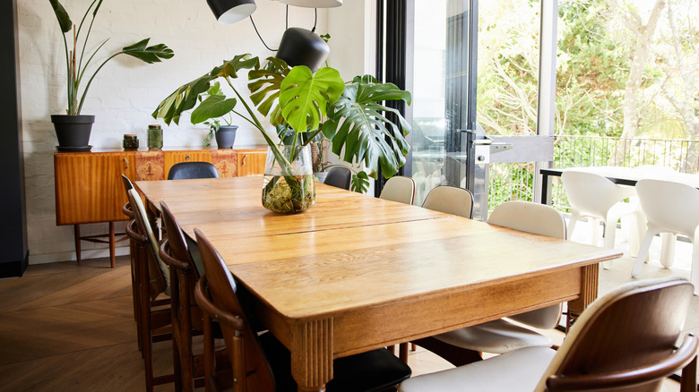 A dining space with a large rectangular table