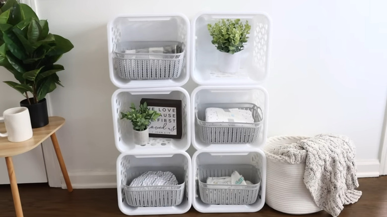 Storage cubes stacked on top of each other to create a shelving unit