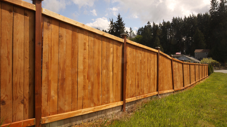 A new six feet tall wooden security fence