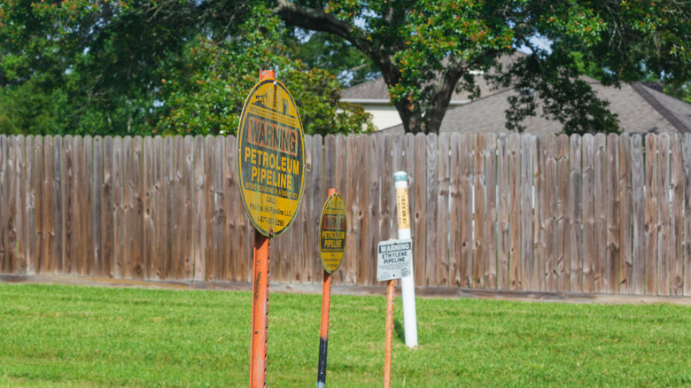 Petroleum pipeline easement in suburban neighborhood