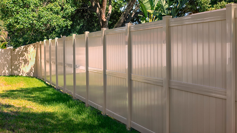 Shiny, plastic-looking vinyl fence