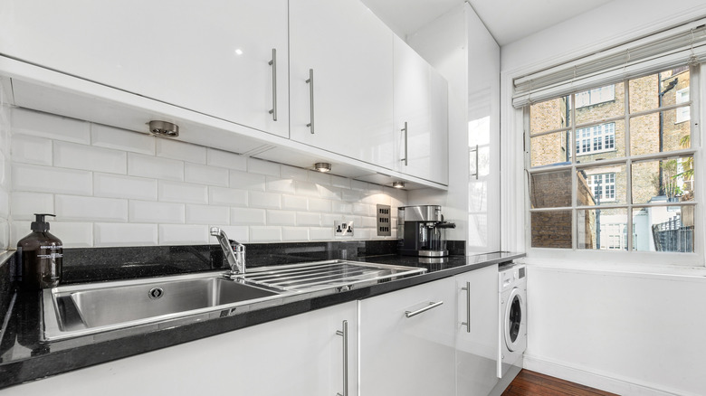 Bright white modern galley kitchen