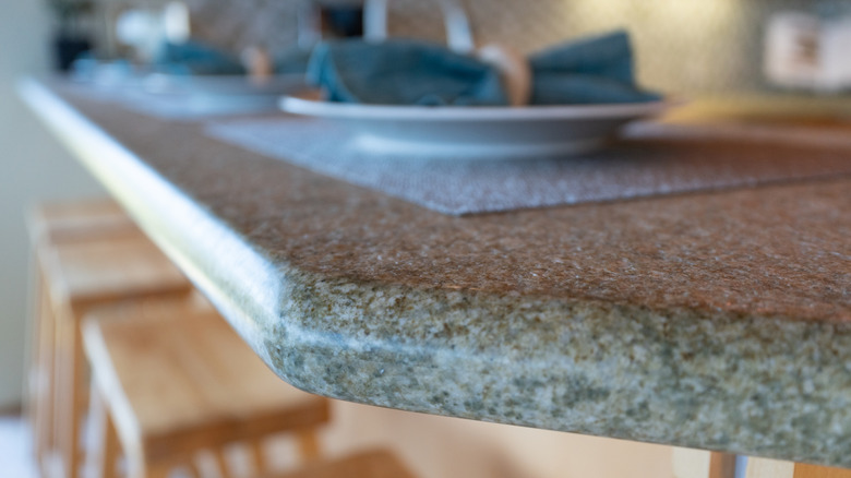 Close-up of a granite countertop with rounded edges
