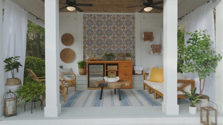 Erin Napier designed an outdoor patio for an episode of "Home Town," with a tile feature wall.