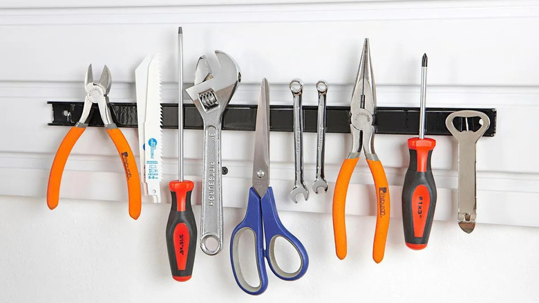 An assortment of hand tools organized on U.S. General's 18-inch Magnetic Tool Holder