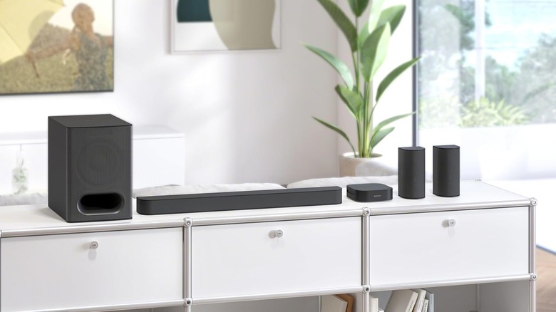 The Sony BRAVIA Theater System 6 5.1ch Sound Bar with Subwoofer and Rear Speakers on a table