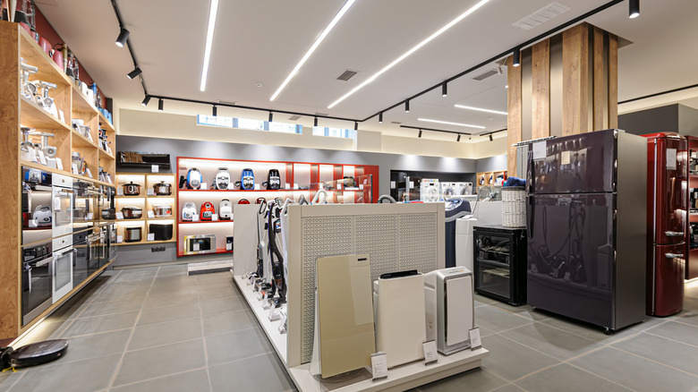 Fridges, heaters and and vacuum cleaners in a home appliance store
