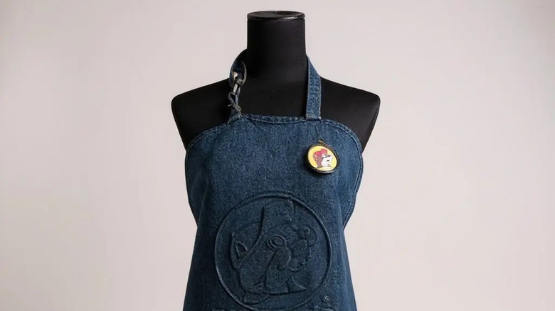 Mannequin wearing Buc-ee's apron