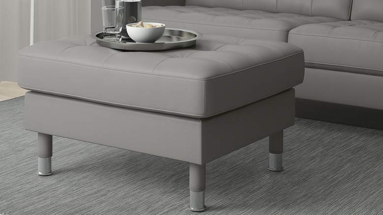 Grey pleather ottoman 