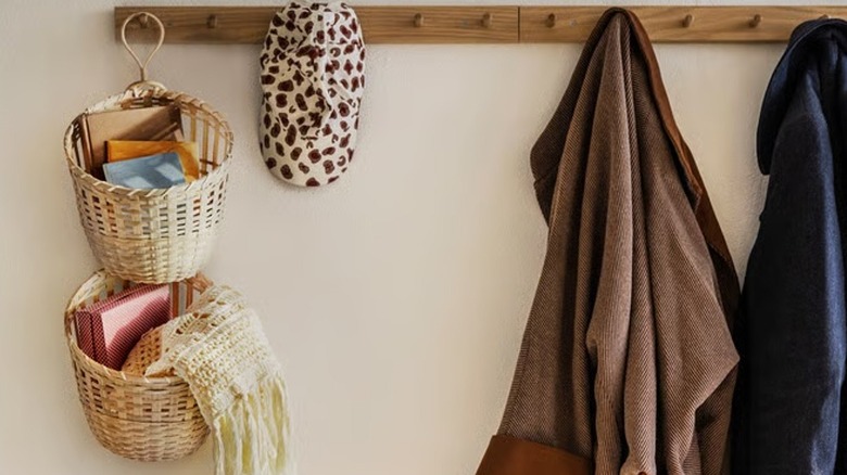 IKEA TOLKNING baskets hanging from wall