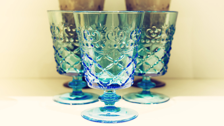 Blue vintage glassware on a shelf