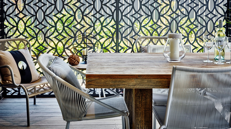 A patio area offered privacy and shade by laser-cut privacy screens