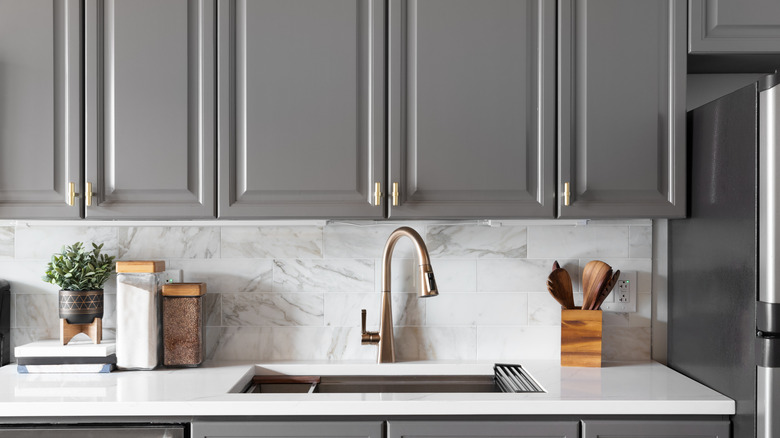 A gray and white kitchen