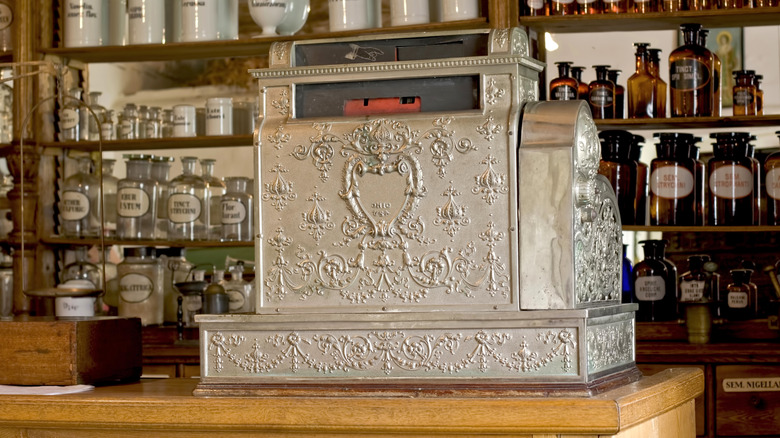 Antique shop register sits on a counter