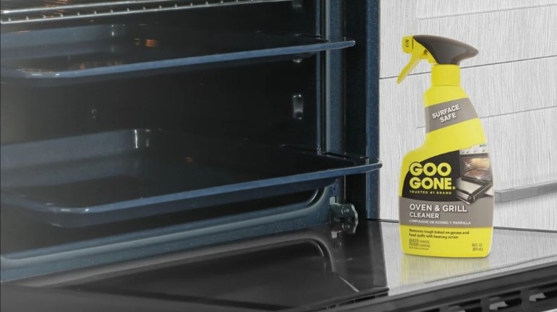 Bottle of Goo Gone sitting on an oven door