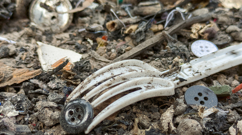 Garbage including plastic fork