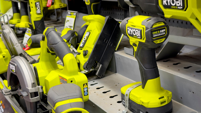 Miscellaneous Ryobi tools on a shelf in a hardware store