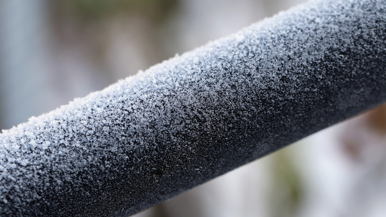 Frost on a black pipe
